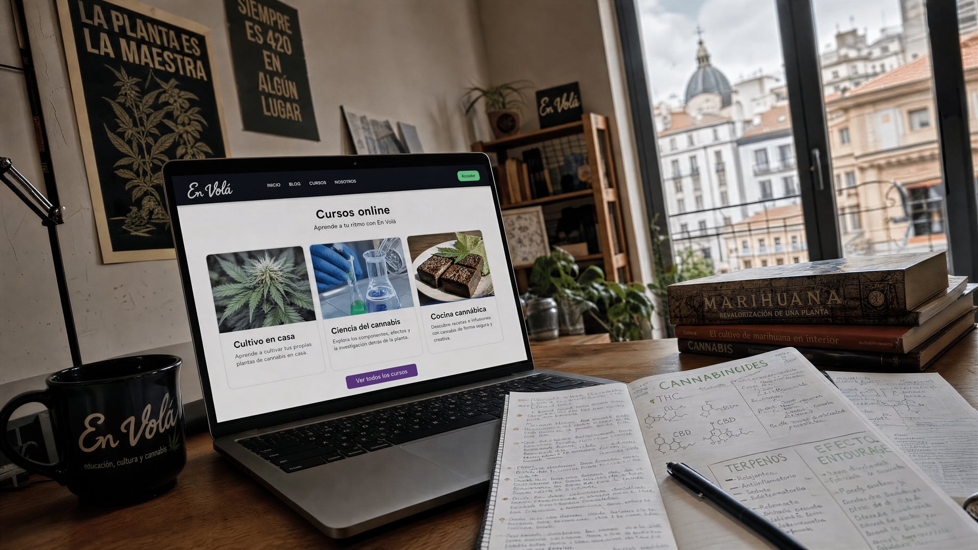 Laptop displaying En Volá’s three online cannabis courses beside annotated education notes